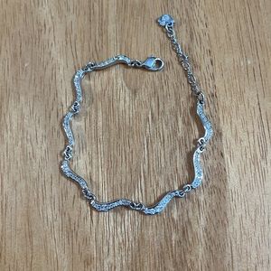 Swarovski crystal bracelet. Missing one stone. See photo.